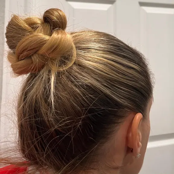 Photo of woman's head with intricate bun