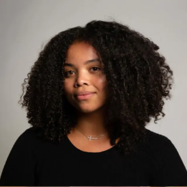 Photo of woman with coily hair